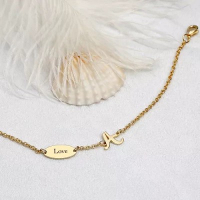 Bracelet jonc infini avec breloques initiales